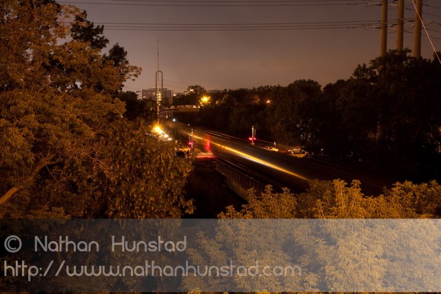 A train passes through Nicollet Island on 4 July 2010